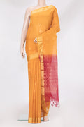 Mustard Silk Cotton Saree with Zari Butta on the body and Zari Border.  displayed on a mannequin