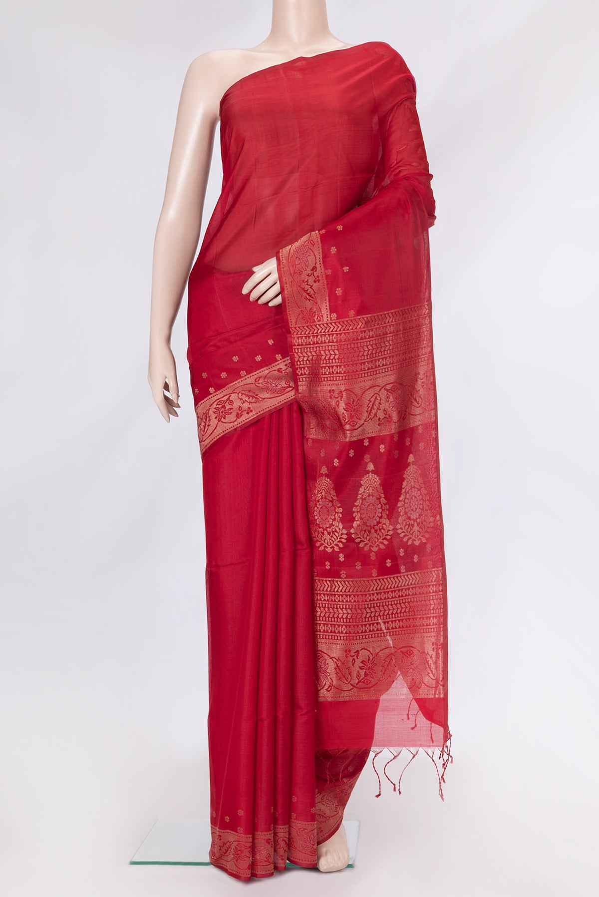 Red Dual Tone Silk Cotton Saree with Zari Butta on the body and Zari Border.  displayed on a mannequin