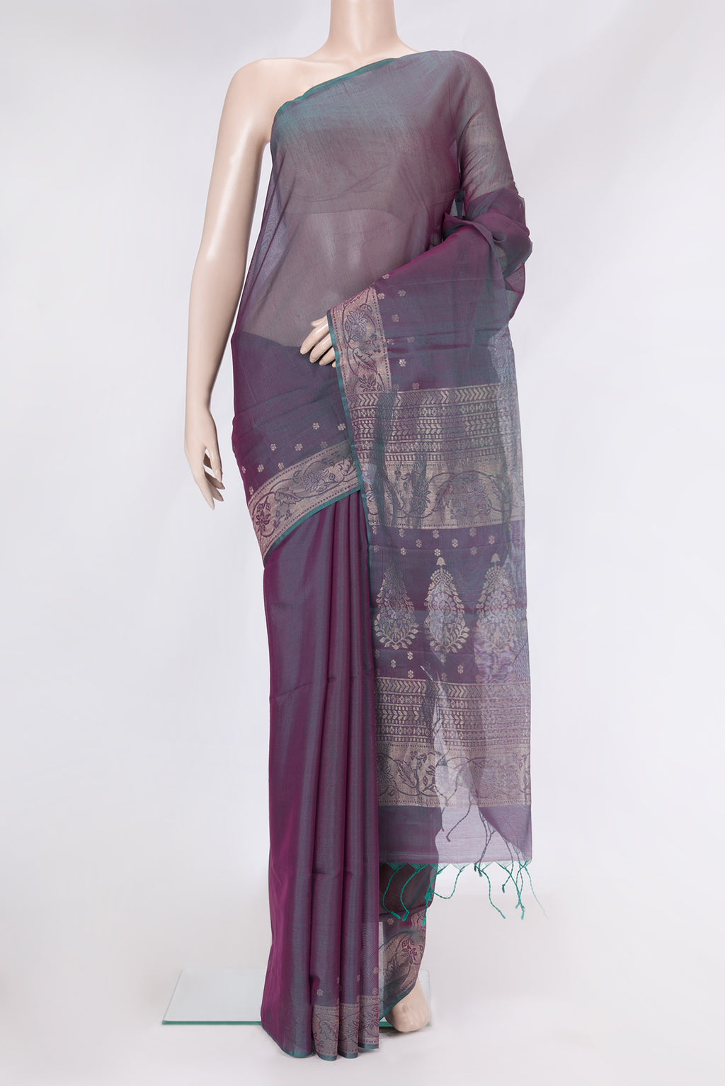Peacock Blue Dual Tone Silk Cotton Saree with Zari Butta on the body and Zari Border.  displayed on a mannequin