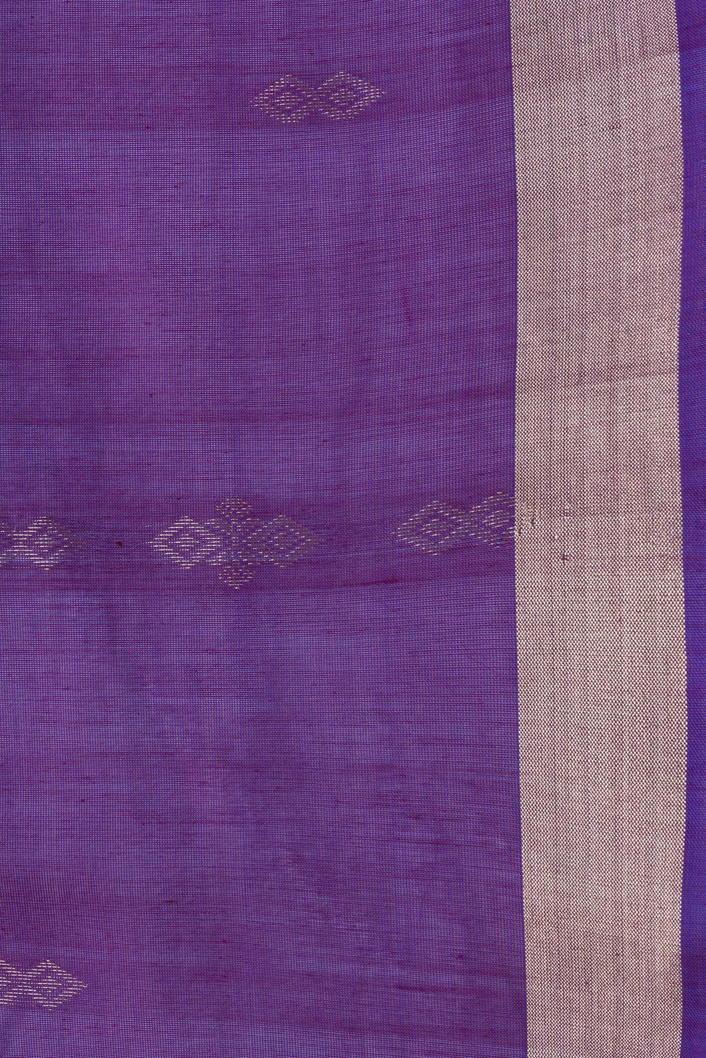 Border image of Purple Dual Tone Silk Cotton Saree with Zari Butta on the body and Zari Border. 