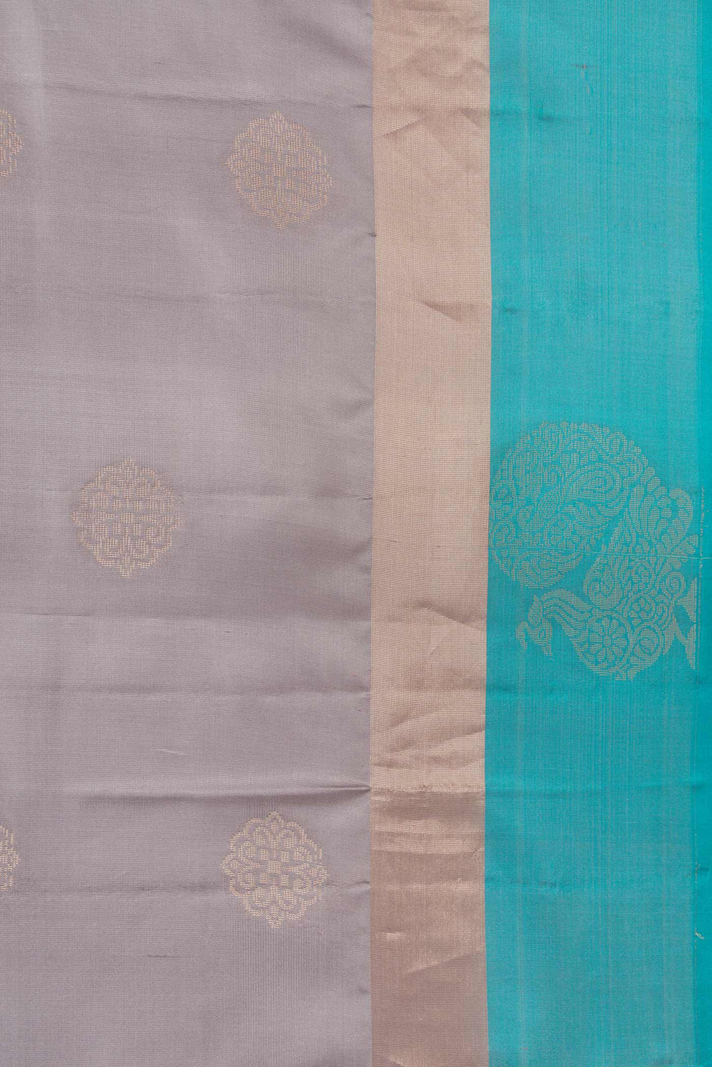 Border image of Grey Dual Tone Soft Silk Saree with Zari Butta on the body and Fancy Border. 
