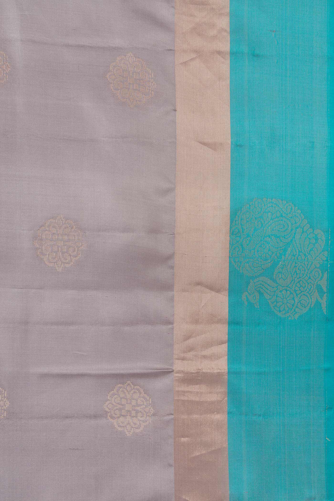 Border image of Grey Dual Tone Soft Silk Saree with Zari Butta on the body and Fancy Border. 