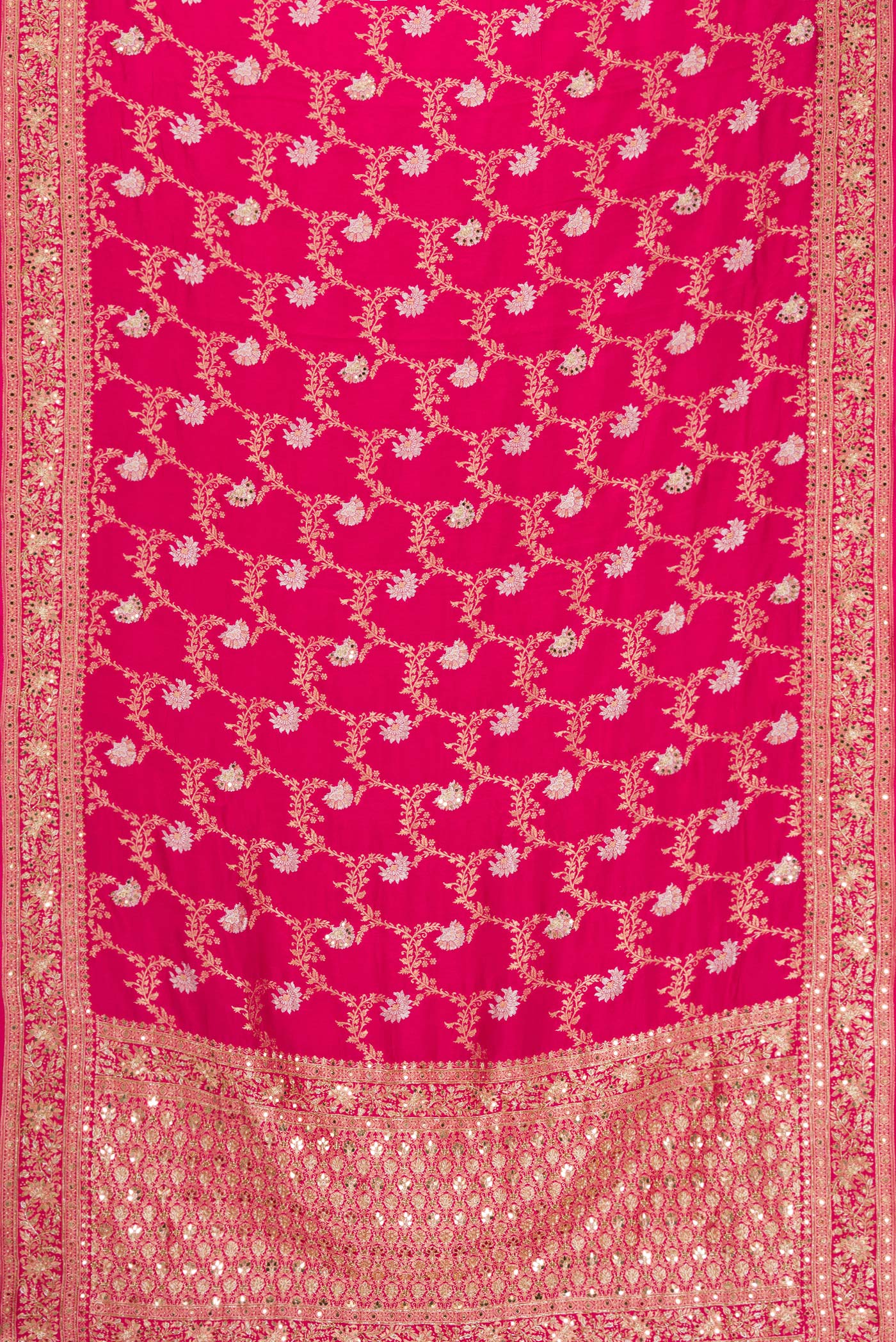 Flat view of Pink Dual Tone Georgette Saree with Zari Brocade on the body and Embroidery Border. 