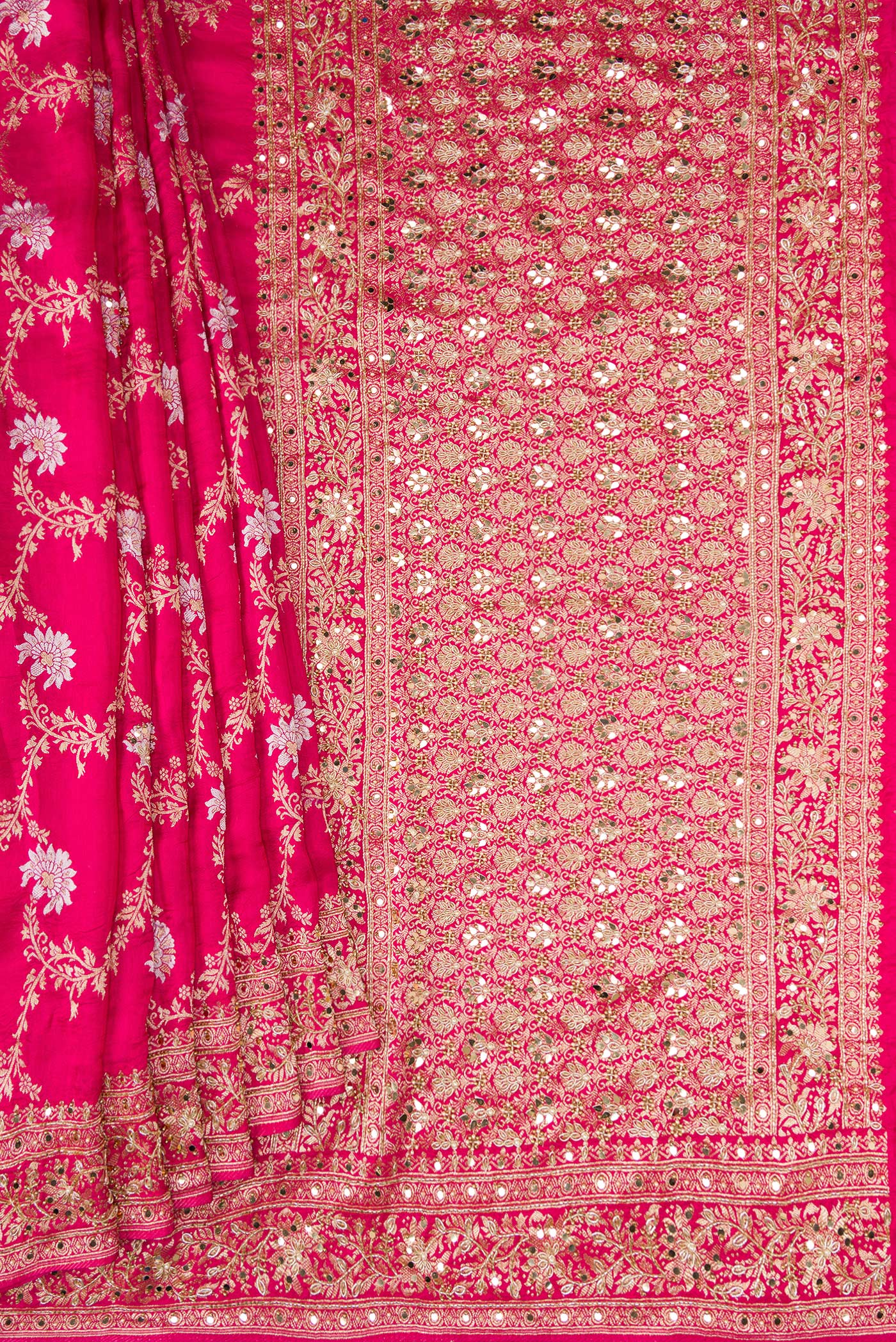 Pleats and pallu of Pink Dual Tone Georgette Saree with Zari Brocade on the body and Embroidery Border. 