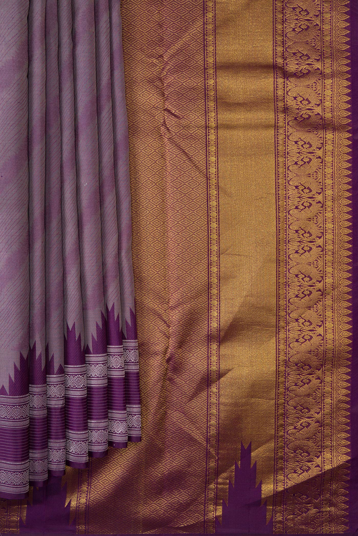 Pleats and pallu of Burgundy Dual Tone Kanchipuram Silk Saree with Jacquard design on the body and Temple Border. 