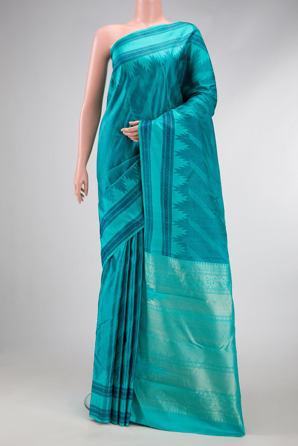 Sky Blue Dual Tone Kanchipuram Silk Saree with Jacquard design on the body and Temple Border.  displayed on a mannequin