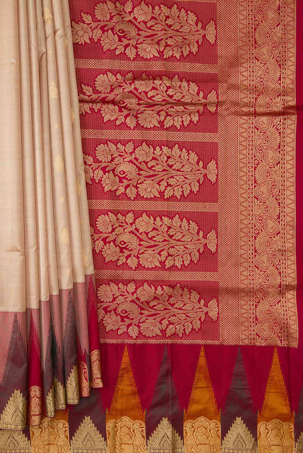 Pleats and pallu of Beige Dual Tone Kanchipuram Silk Saree with Zari Butta on the body and Temple Border. 
