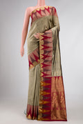 Grey Dual Tone Kanchipuram Silk Saree with Zari Butta on the body and Temple Border.  displayed on a mannequin