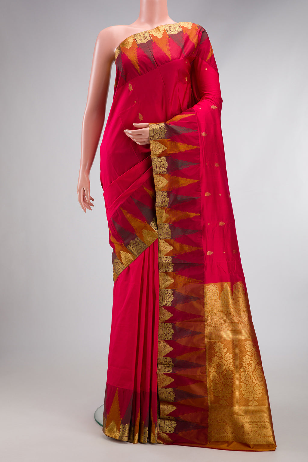 Red Dual Tone Kanchipuram Silk Saree with Zari Butta on the body and Temple Border.  displayed on a mannequin