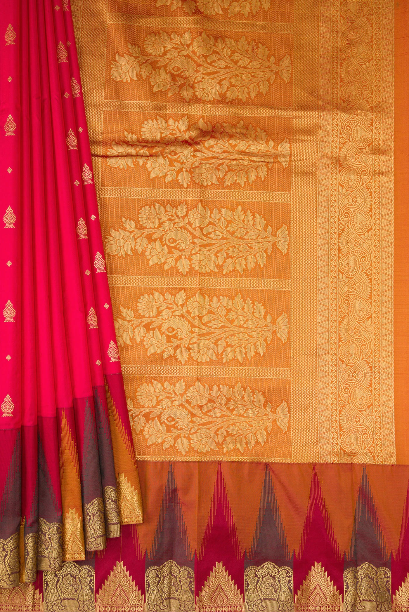 Pleats and pallu of Red Dual Tone Kanchipuram Silk Saree with Zari Butta on the body and Temple Border. 