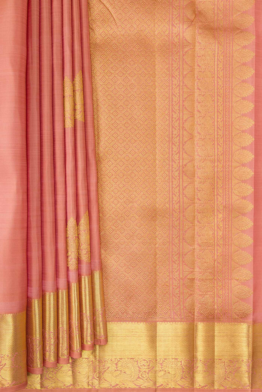 Pleats and pallu of Rose Gold Dual Tone Kanjivaram Silk Saree with Zari Butta on the body and Zari Border. 