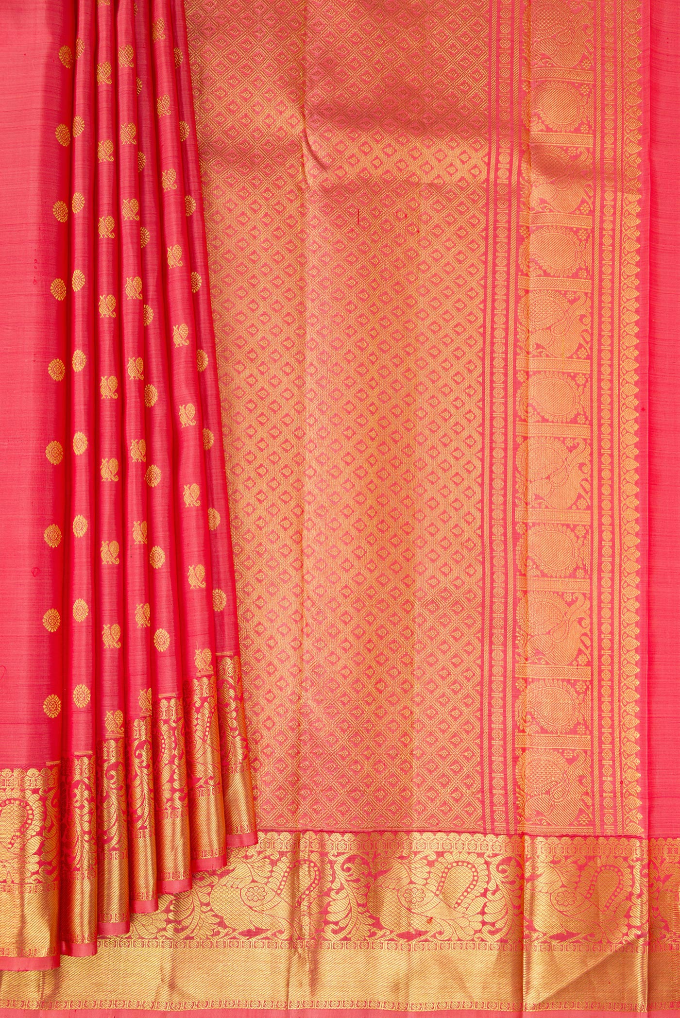 Pleats and pallu of Pink Kanjivaram Silk Saree with Zari Butta on the body and Zari Border. 