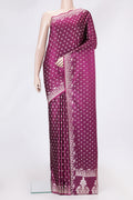 Magenta Dual Tone Banarasi Silk Saree with Zari Butta on the body and Fancy Border.  displayed on a mannequin