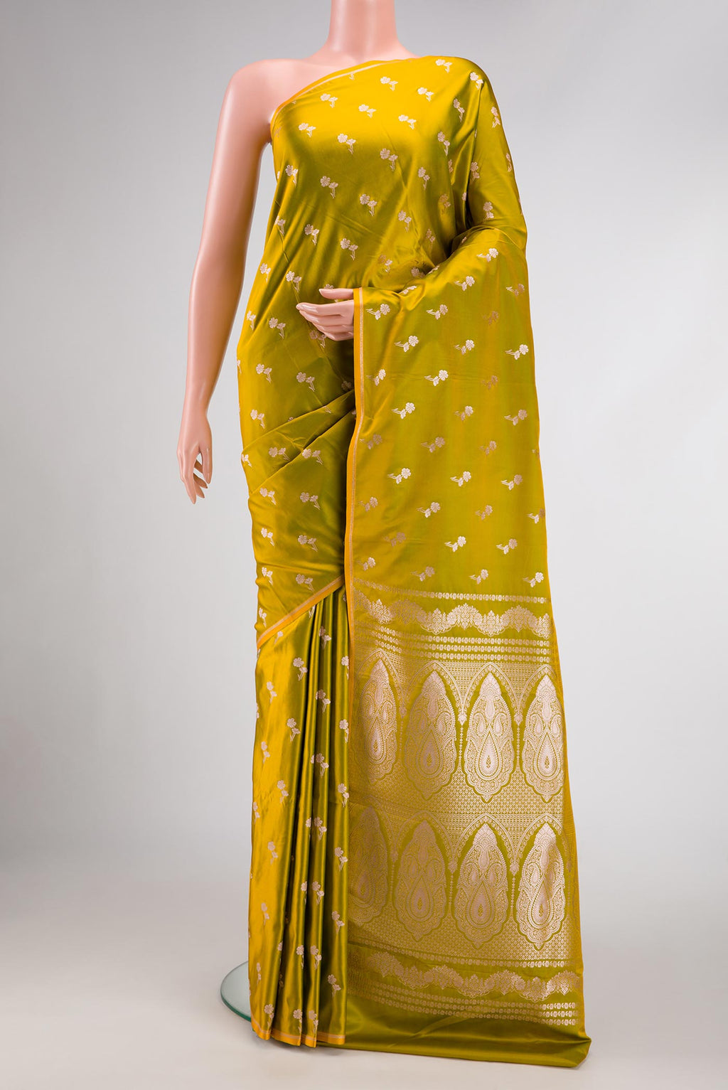 Mehandi Green Dual Tone Blended Banarasi Silk Saree with Zari Butta on the body and Zari Border.  displayed on a mannequin