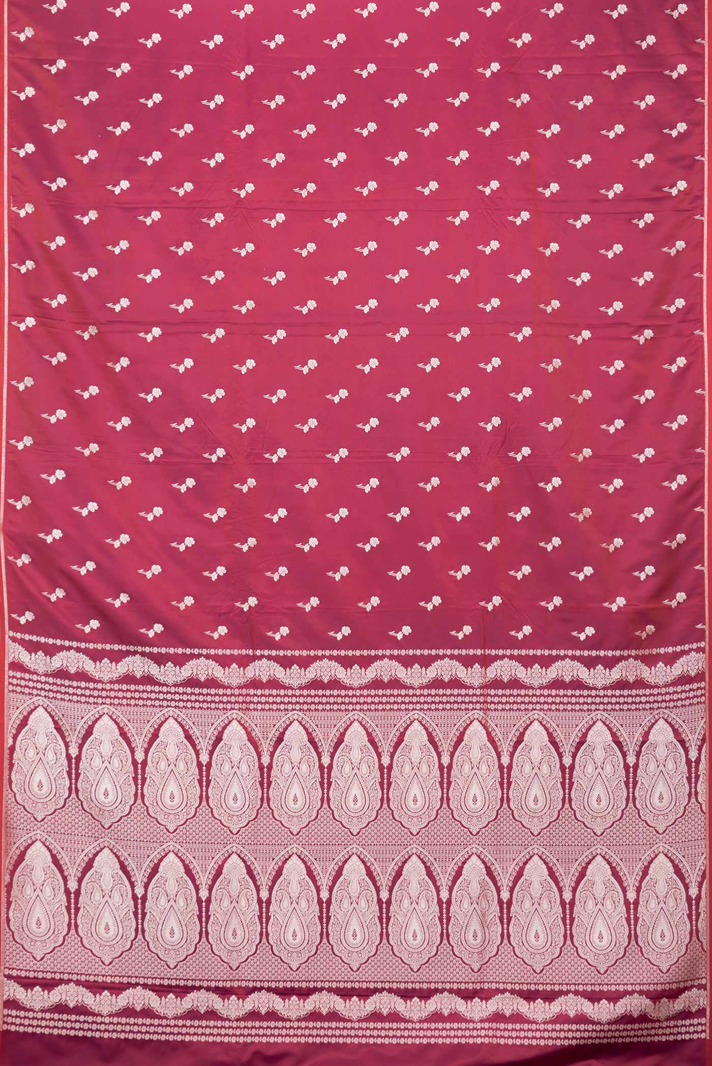 Flat view of Maroon Dual Tone Blended Banarasi Silk Saree with Zari Butta on the body and Zari Border. 