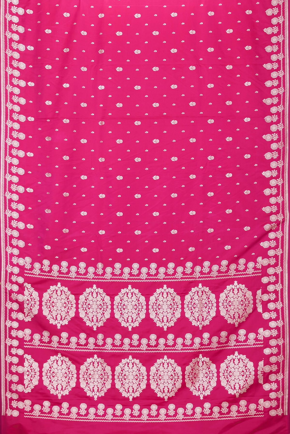 Flat view of Pink Dual Tone Banarasi Silk Saree with Zari Butta on the body and Fancy Border. 