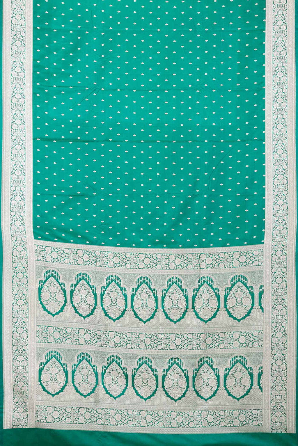 Flat view of Green Dual Tone Blended Banarasi Silk Saree with Zari Butta on the body and Zari Border. 