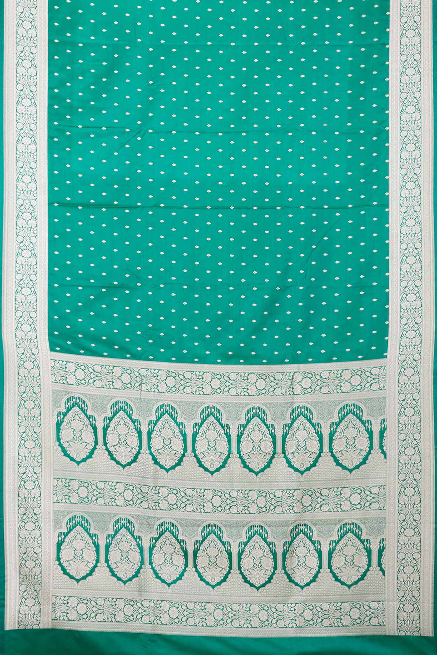 Flat view of Green Dual Tone Blended Banarasi Silk Saree with Zari Butta on the body and Zari Border. 