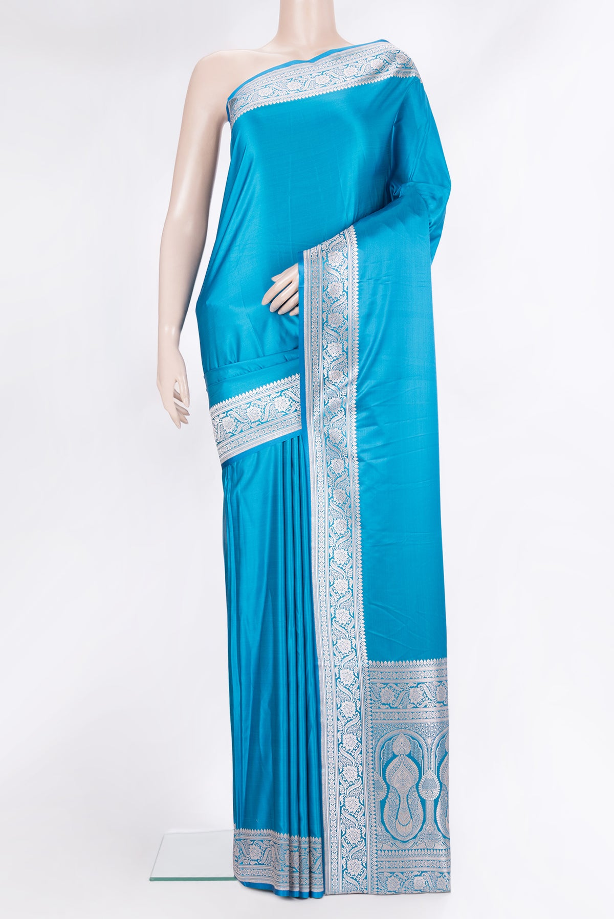 Sky Blue Blended Banarasi Silk Saree with Plain Body and Zari Border.  displayed on a mannequin