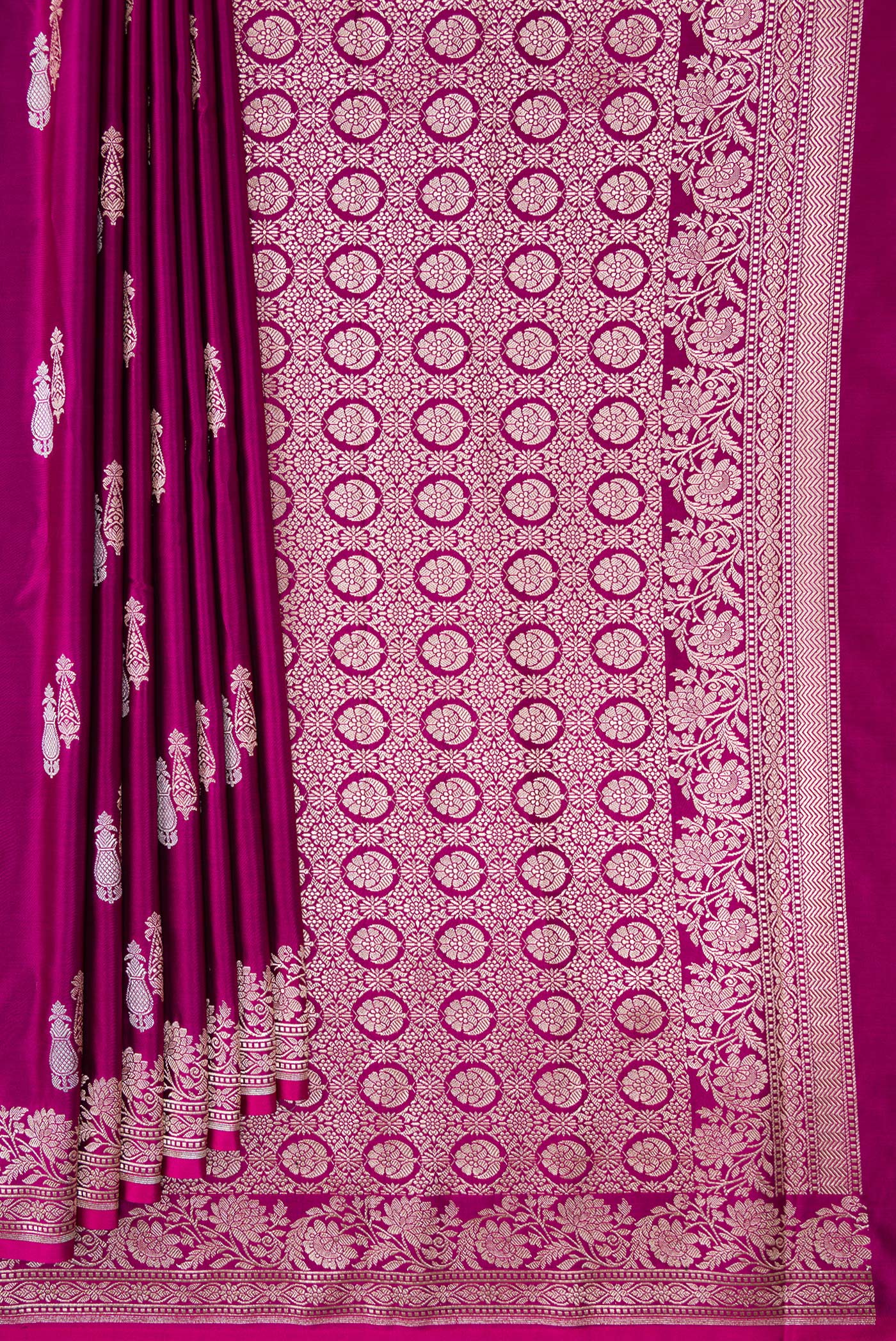 Pleats and pallu of Burgundy Dual Tone Banarasi Silk Saree with Zari Butta on the body and Zari Border. 