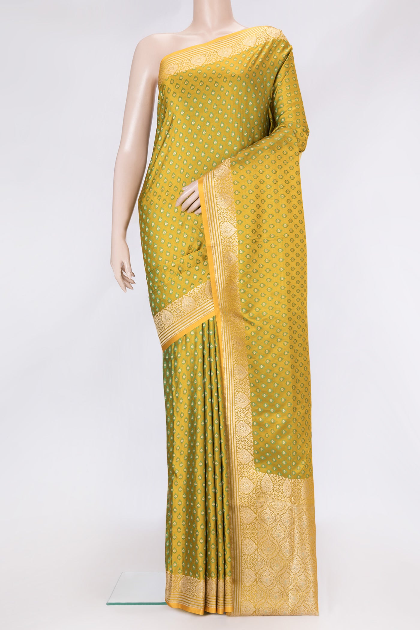 Mehandi Green Dual Tone Blended Banarasi Silk Saree with Zari And Thread Butta on the body and Zari Border.  displayed on a mannequin