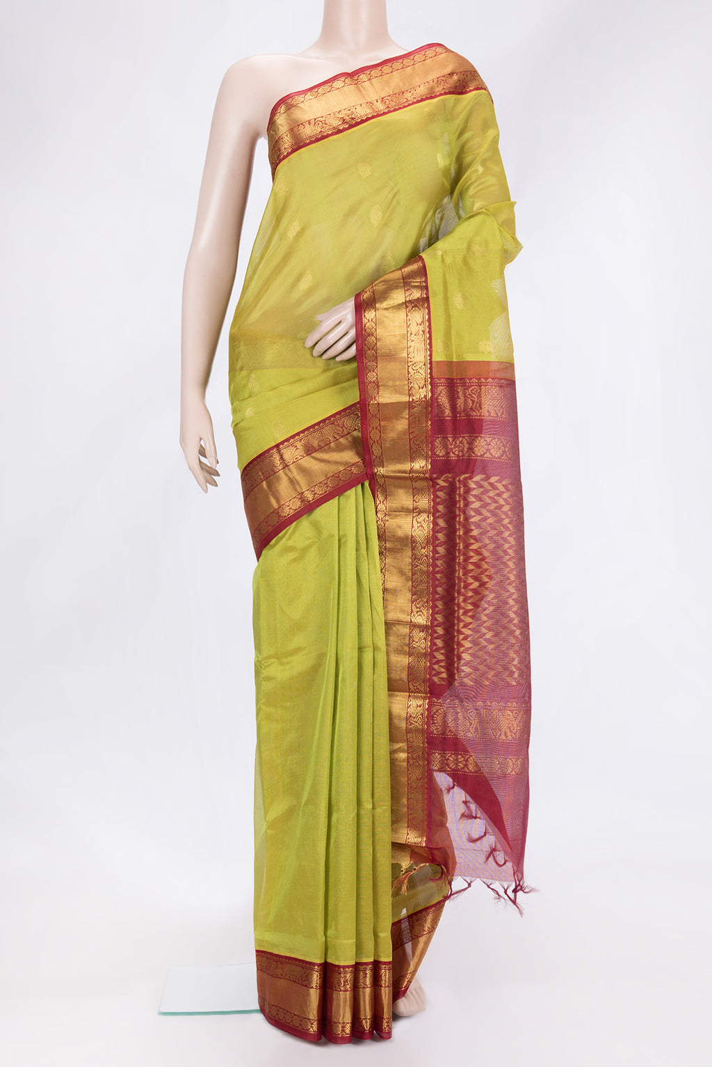 Green Dual Tone Silk Cotton Saree with Zari Butta on the body and Zari Border.  displayed on a mannequin