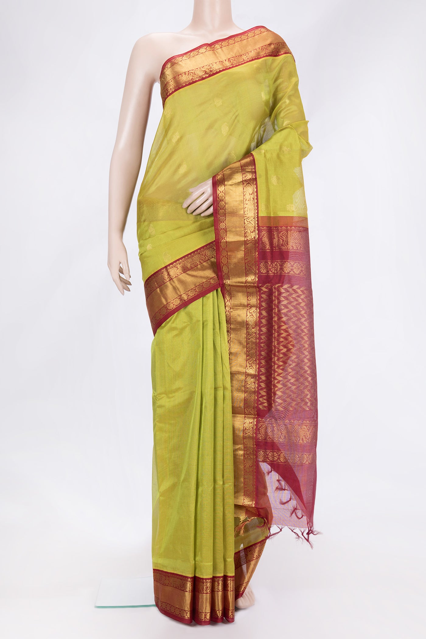 Green Dual Tone Silk Cotton Saree with Zari Butta on the body and Zari Border.  displayed on a mannequin