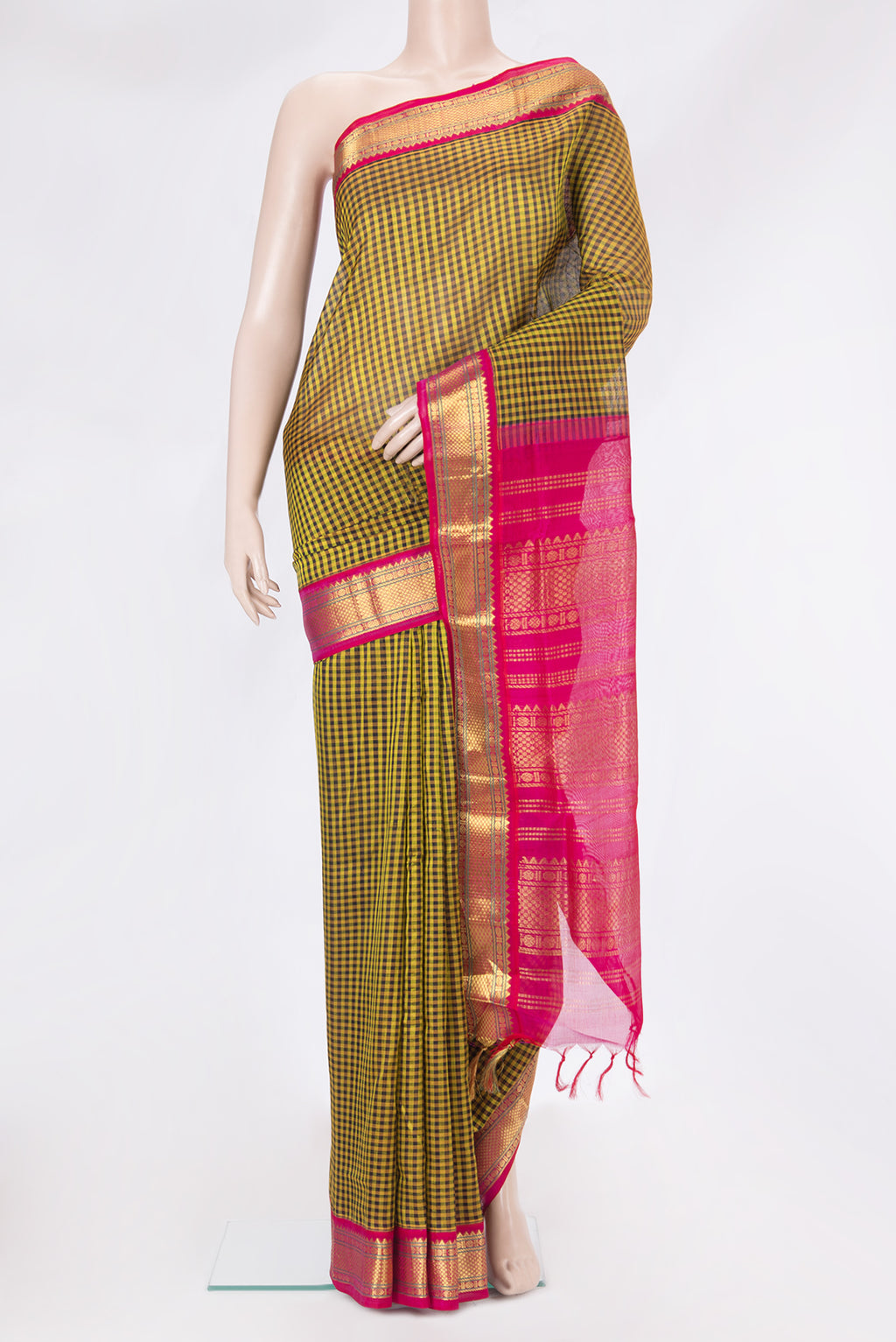 Multi Color Silk Cotton Saree with Checked design on the body and Zari Border.  displayed on a mannequin