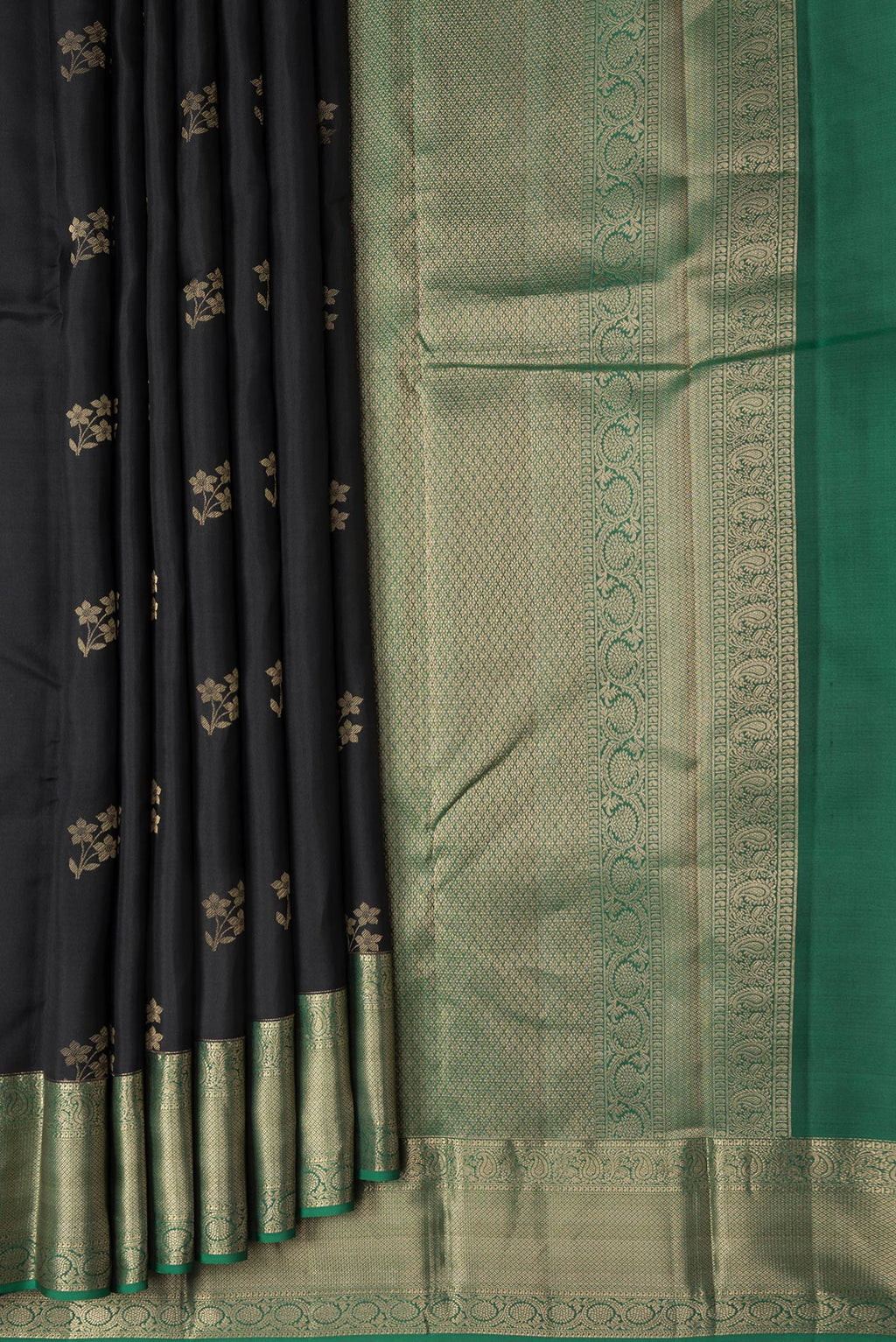 Pleats and pallu of Black Dual Tone Kanjivaram Silk Saree with Zari Butta on the body and Zari Border. 