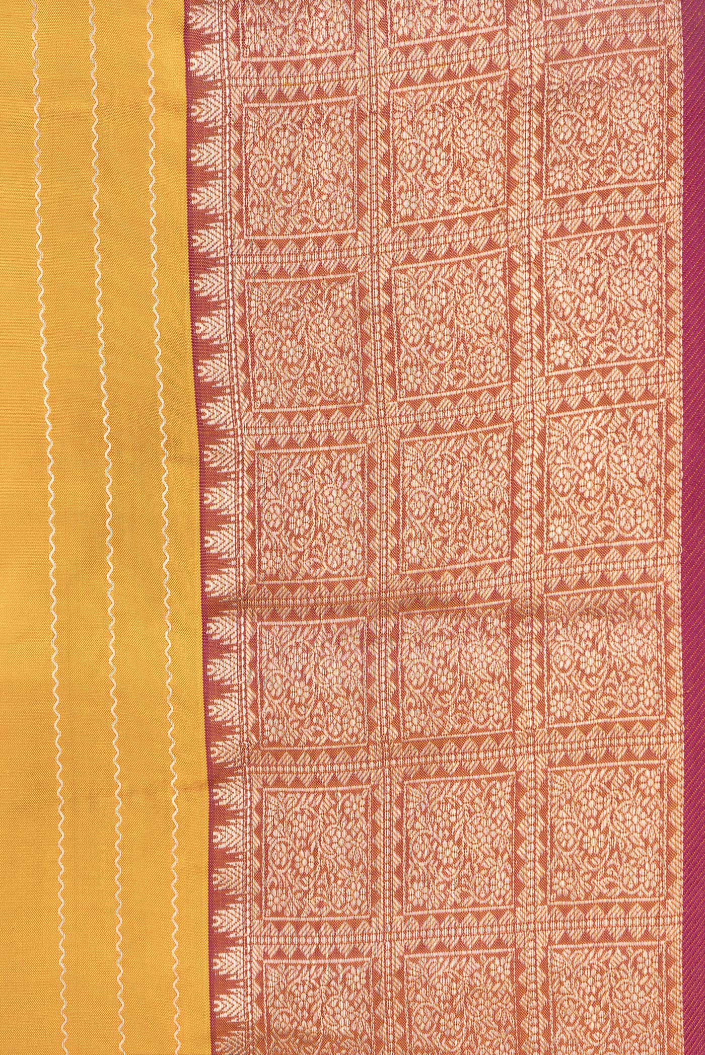 Border image of Mustard Dual Tone Kanchipuram Silk Saree with Stripes on the body and Zari Border. 