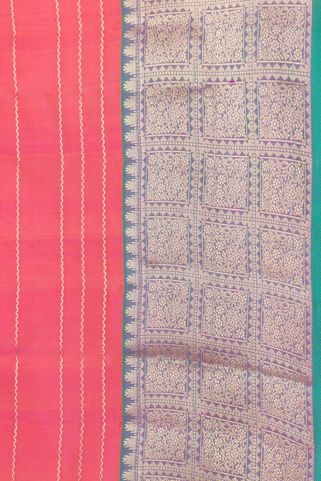 Border image of Orange Dual Tone Kanchipuram Silk Saree with Stripes on the body and Zari Border. 