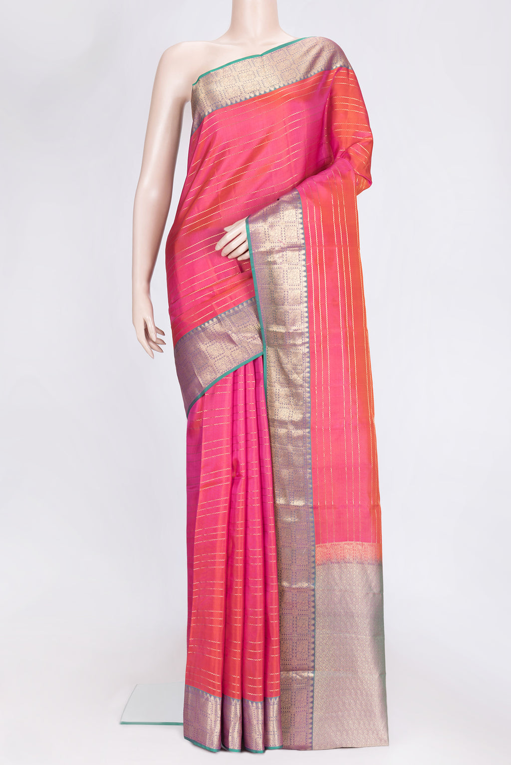 Orange Dual Tone Kanchipuram Silk Saree with Stripes on the body and Zari Border.  displayed on a mannequin