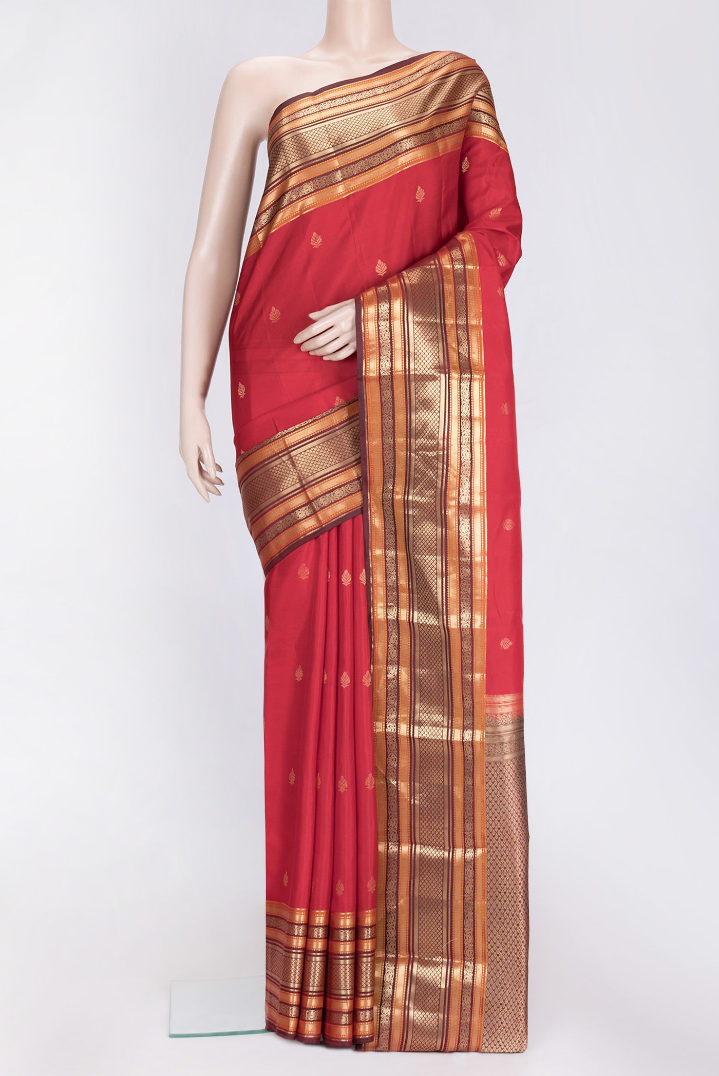 Red Dual Tone Kanchipuram Silk Saree with Zari Butta on the body and Zari Border.  displayed on a mannequin