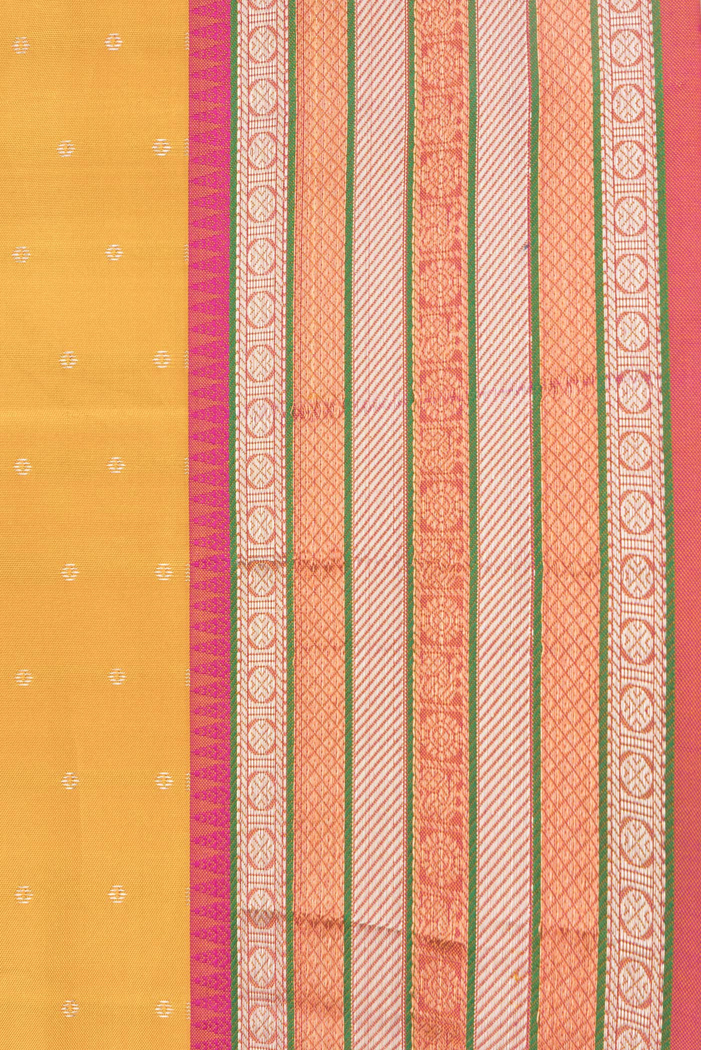 Border image of Mustard Dual Tone Kanchipuram Silk Saree with Zari Butta on the body and Zari Border. 