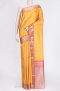 Mustard Dual Tone Kanchipuram Silk Saree with Zari Butta on the body and Zari Border.  displayed on a mannequin