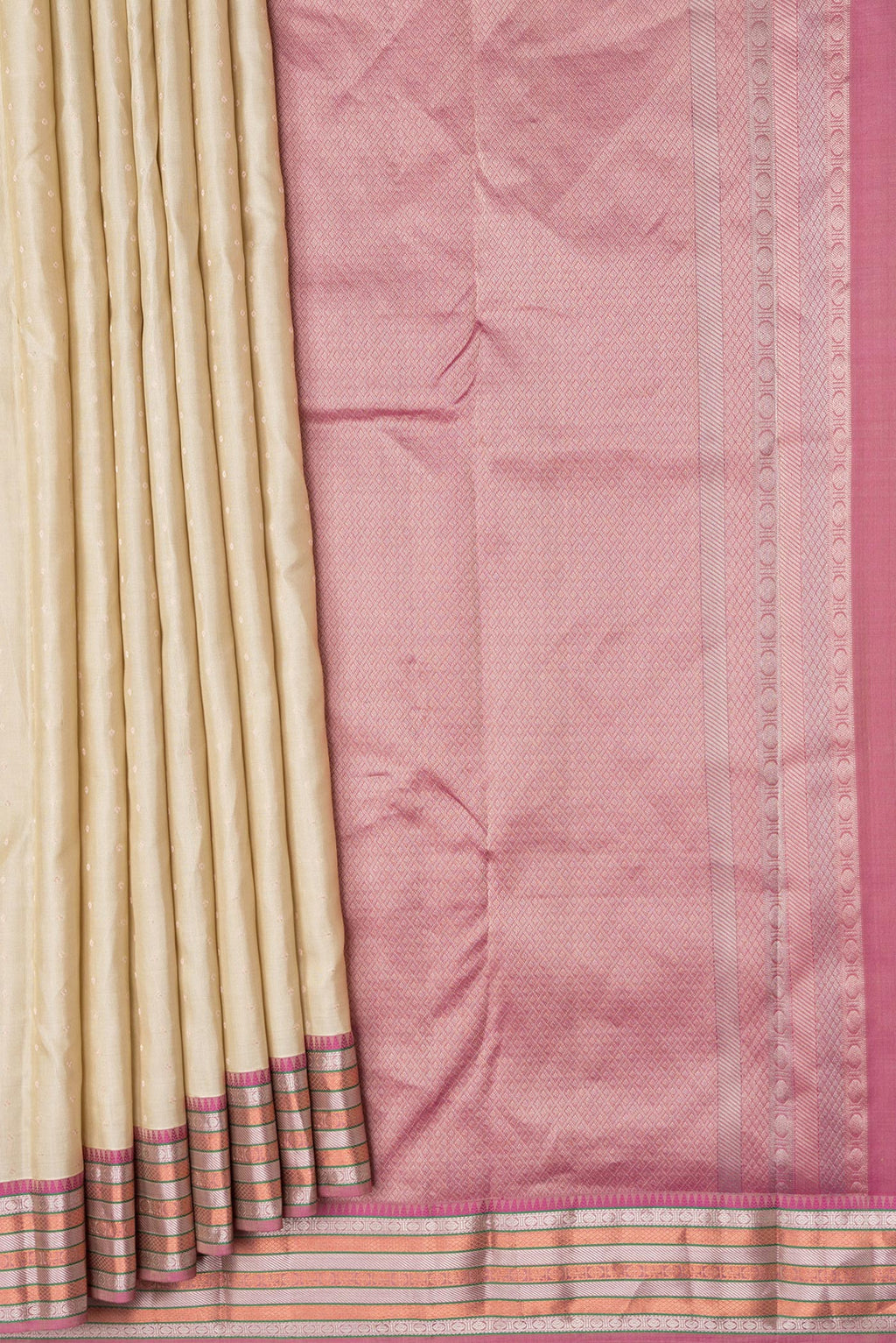 Pleats and pallu of Beige Dual Tone Kanchipuram Silk Saree with Zari Butta on the body and Zari Border. 