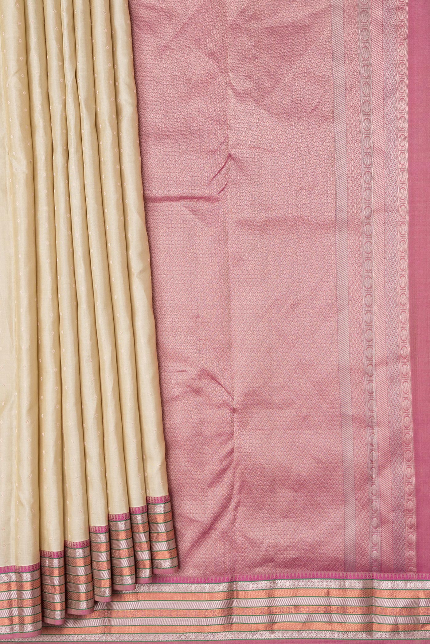 Pleats and pallu of Beige Dual Tone Kanchipuram Silk Saree with Zari Butta on the body and Zari Border. 