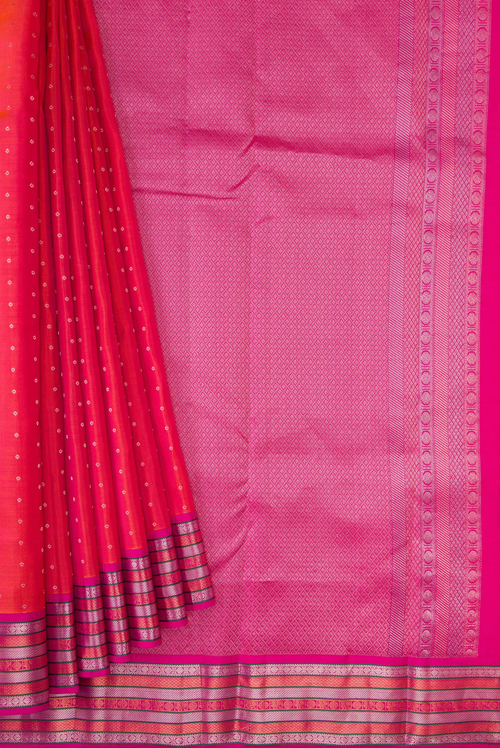 Pleats and pallu of Coral Dual Tone Kanchipuram Silk Saree with Zari Butta on the body and Zari Border. 
