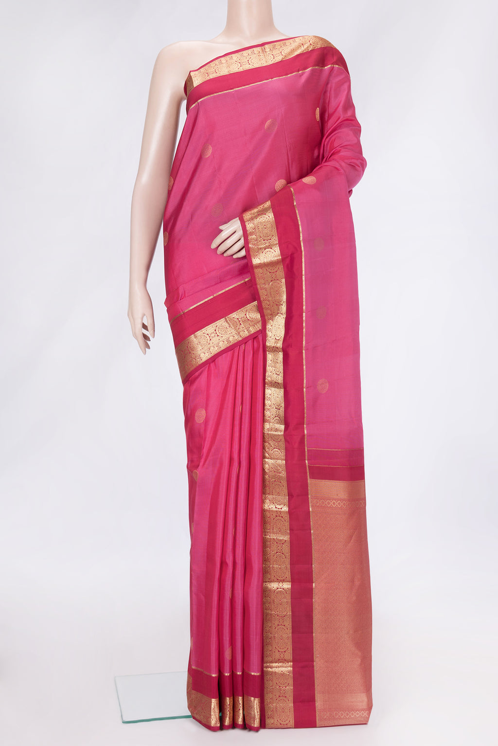 Pink Dual Tone Kanchipuram Silk Saree with Zari Butta on the body and Zari Border.  displayed on a mannequin