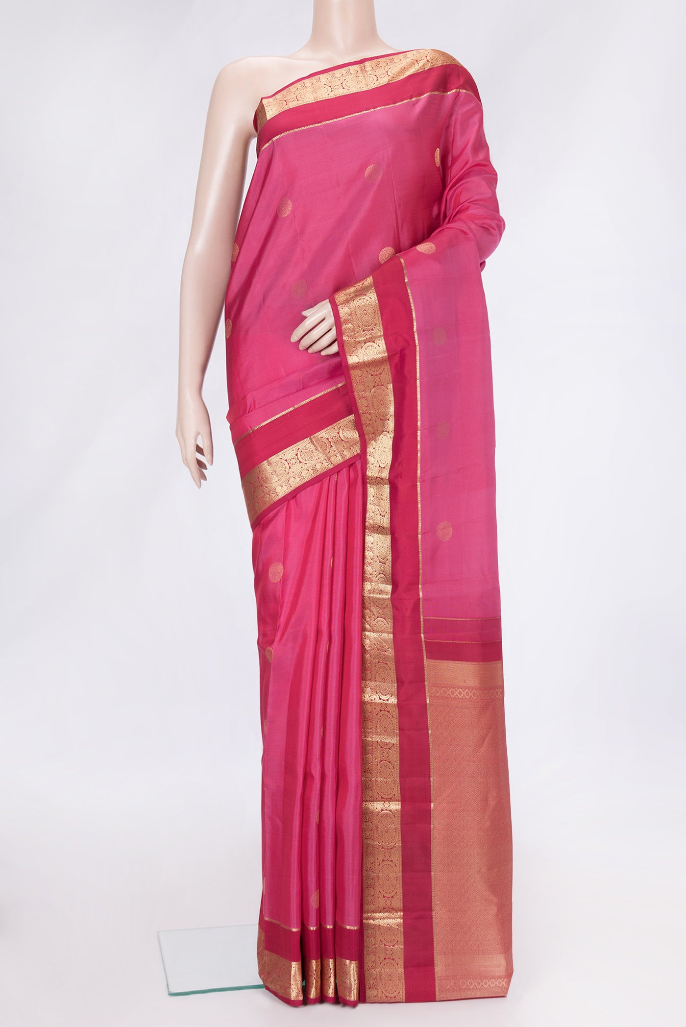Pink Dual Tone Kanchipuram Silk Saree with Zari Butta on the body and Zari Border.  displayed on a mannequin
