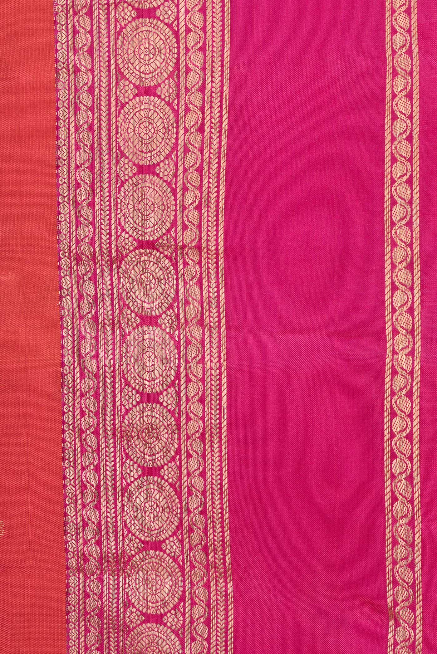 Border image of Orange Dual Tone Kanchipuram Silk Saree with Zari Butta on the body and Zari Border. 