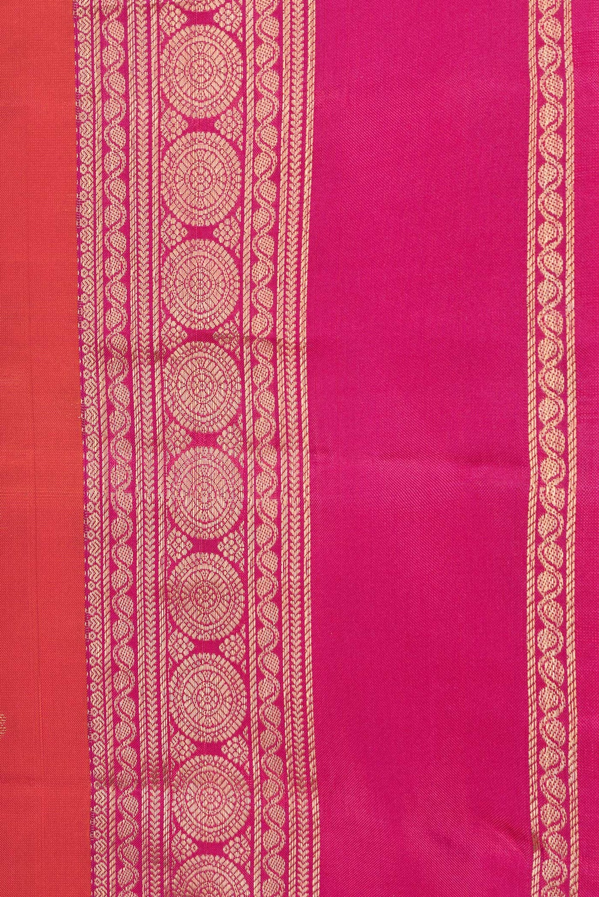 Border image of Orange Dual Tone Kanchipuram Silk Saree with Zari Butta on the body and Zari Border. 