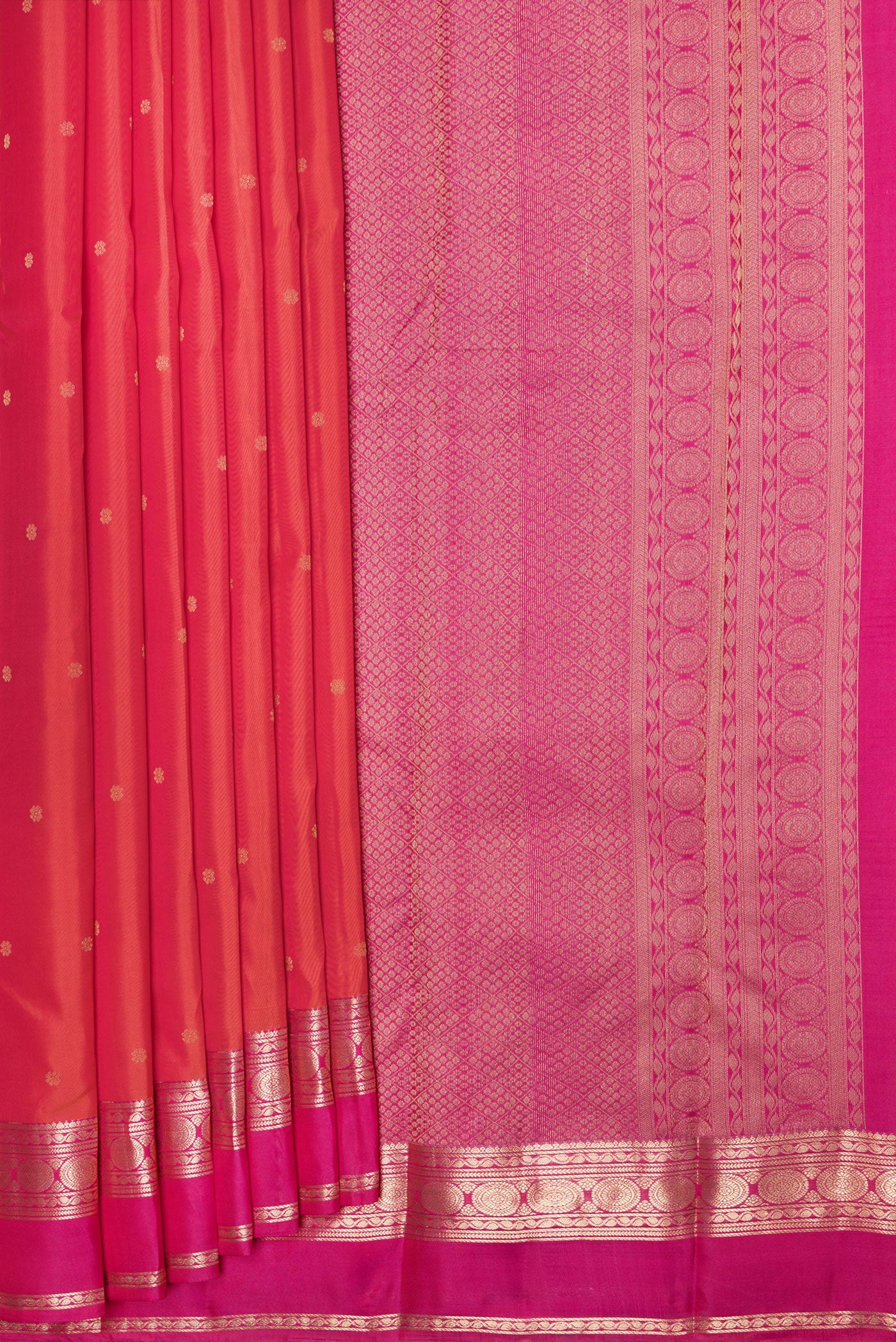 Pleats and pallu of Orange Dual Tone Kanchipuram Silk Saree with Zari Butta on the body and Zari Border. 