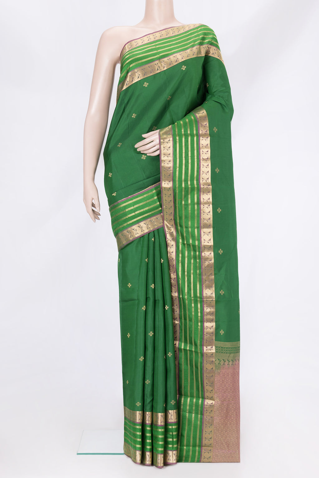 Bottle Green Dual Tone Kanchipuram Silk Saree with Zari Butta on the body and Zari And Thread Border.  displayed on a mannequin