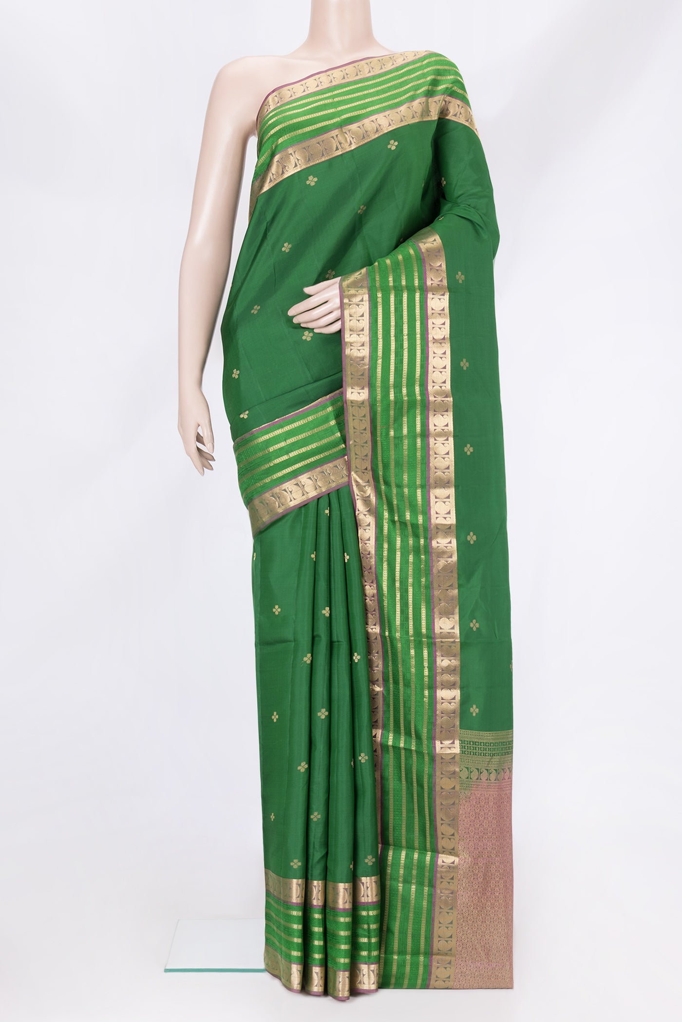 Bottle Green Dual Tone Kanchipuram Silk Saree with Zari Butta on the body and Zari And Thread Border.  displayed on a mannequin