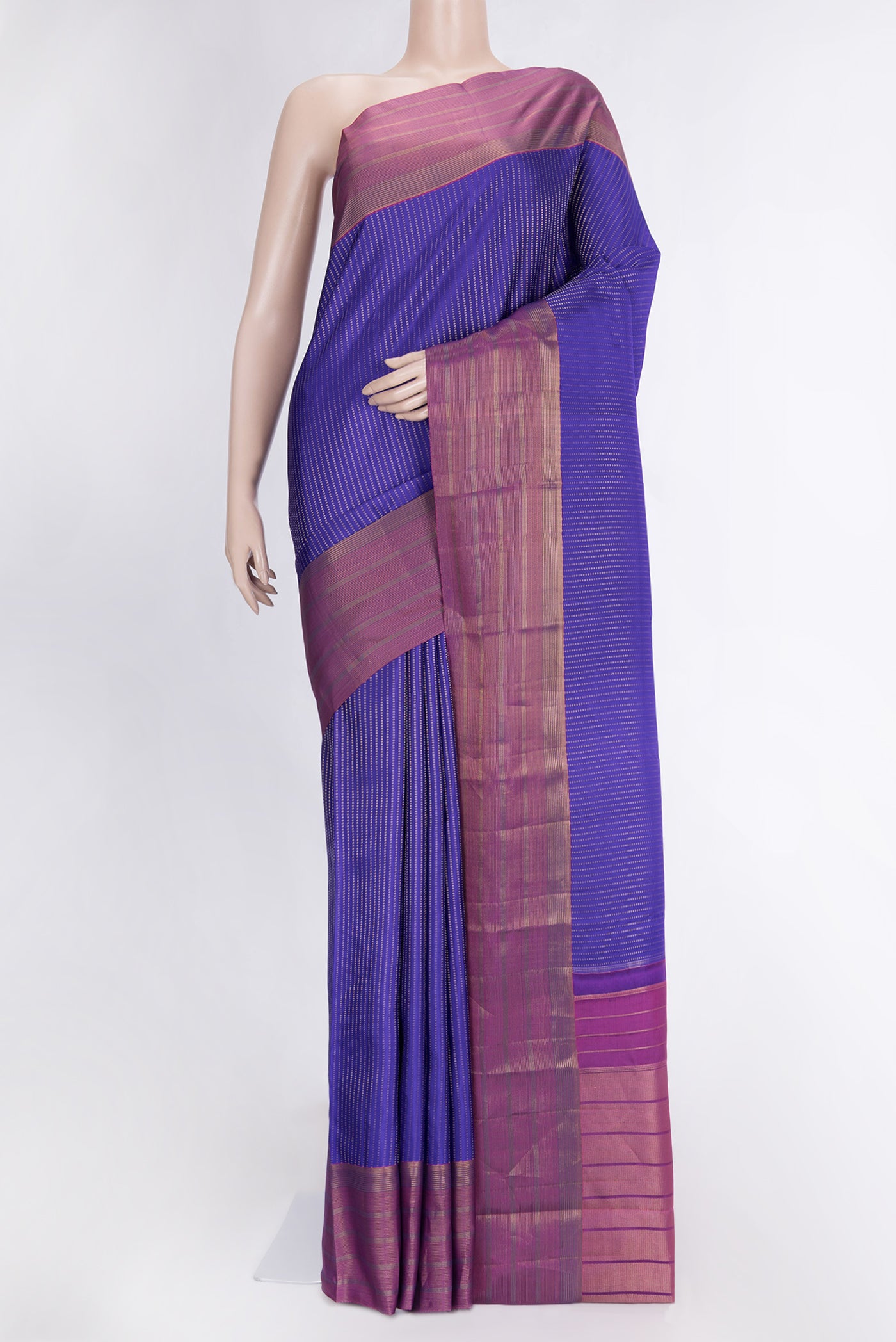 Royal Blue Dual Tone Kanchipuram Silk Saree with Stripes on the body and Zari Border.  displayed on a mannequin