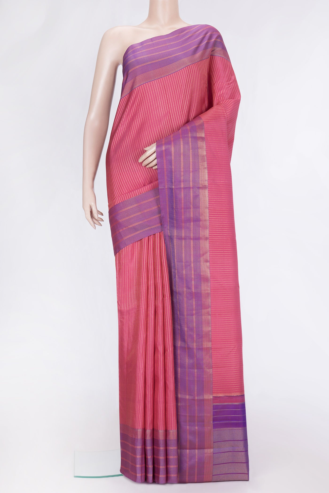 Pink Dual Tone Kanchipuram Silk Saree with Stripes on the body and Zari Border.  displayed on a mannequin