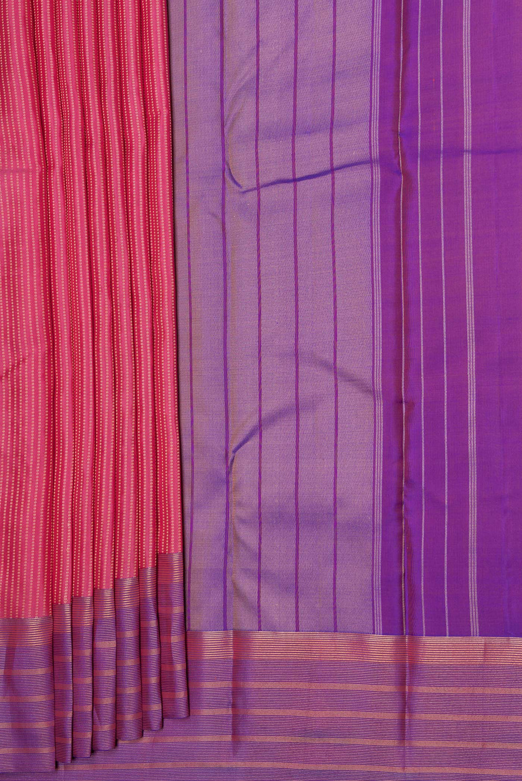 Pleats and pallu of Pink Dual Tone Kanchipuram Silk Saree with Stripes on the body and Zari Border. 