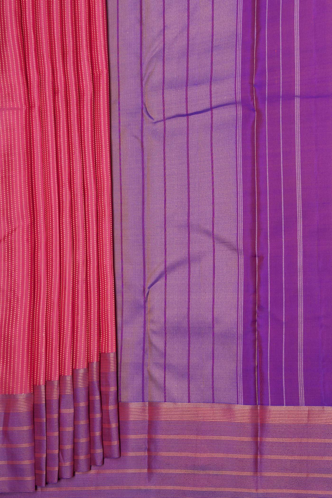 Pleats and pallu of Pink Dual Tone Kanchipuram Silk Saree with Stripes on the body and Zari Border. 