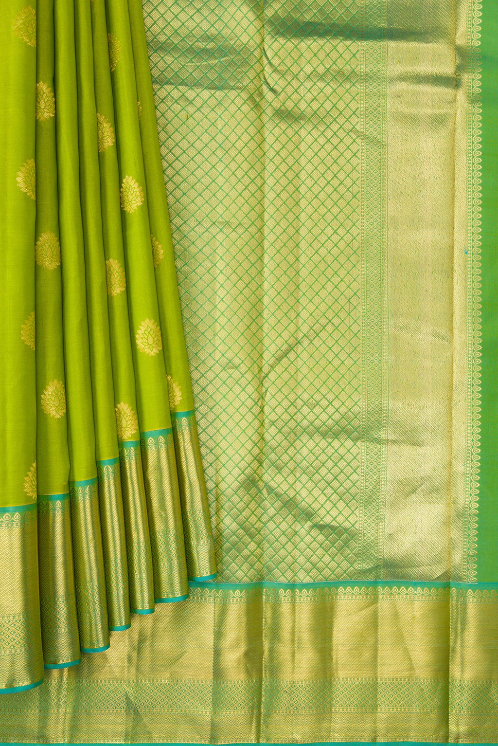 Pleats and pallu of Parrot Green Dual Tone Kanjivaram Silk Saree with Zari Butta on the body and Zari Border. 